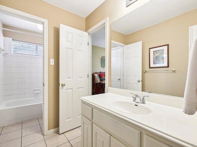 14928 Thatcher Dr, Austin, TX 78717 - full bathroom featuring tile patterned flooring, vanity, shower / washtub combination, and baseboards