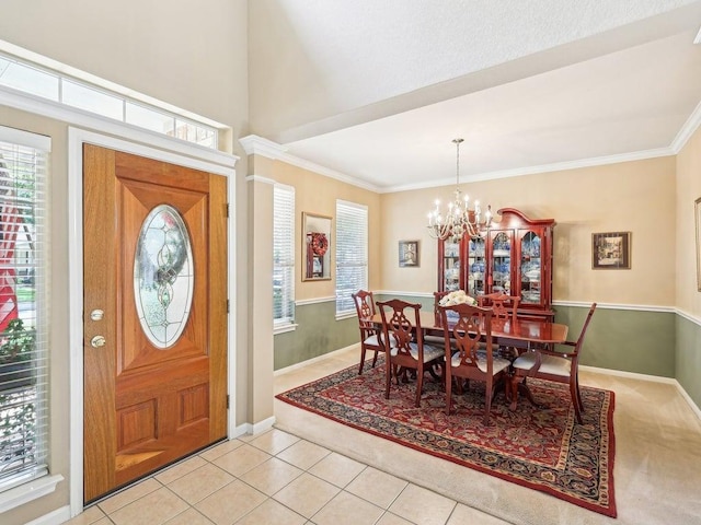 14928 Thatcher Dr, Austin, TX 78717 - entryway featuring plenty of natural light, a chandelier, ornamental molding, baseboards, and light carpet