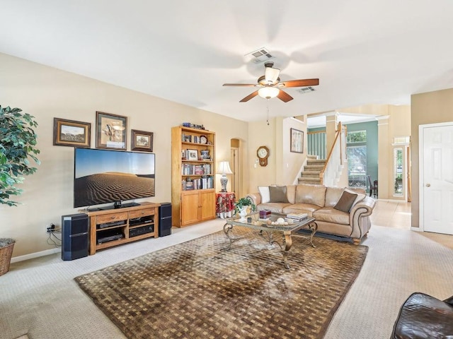 14928 Thatcher Dr, Austin, TX 78717 - carpeted living area with stairway, ceiling fan, and baseboards