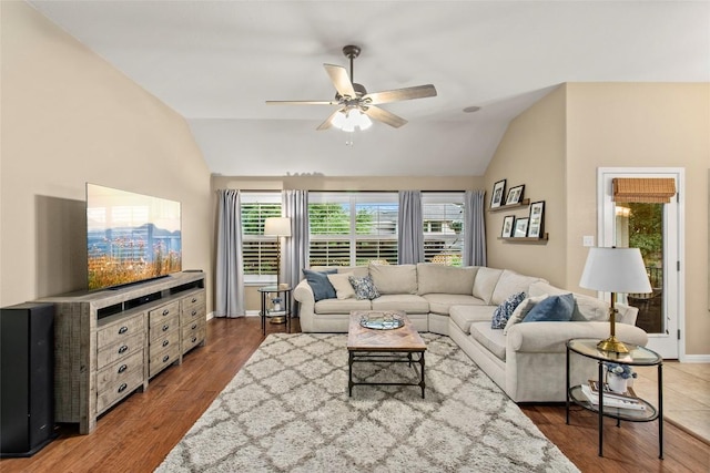 240 Maeves Way, Austin, TX 78737 - living area featuring a ceiling fan, vaulted ceiling, wood finished floors, and baseboards
