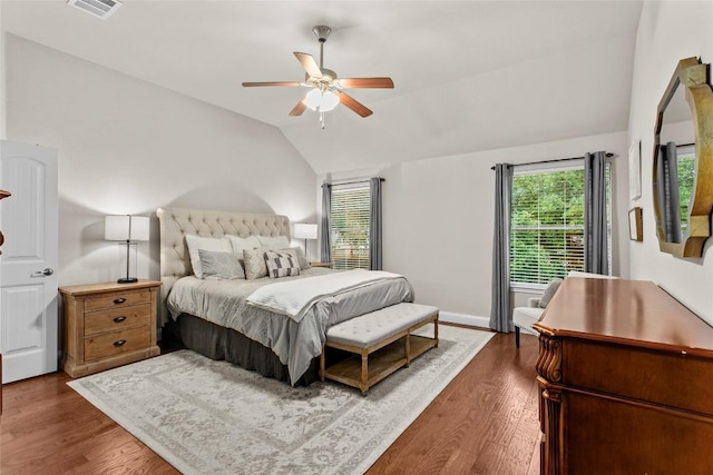 240 Maeves Way, Austin, TX 78737 - bedroom with vaulted ceiling, wood finished floors, a ceiling fan, and baseboards
