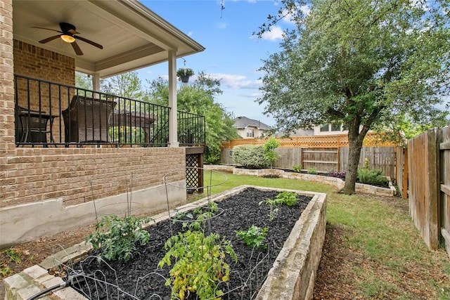 240 Maeves Way, Austin, TX 78737 - view of yard featuring a vegetable garden and ceiling fan