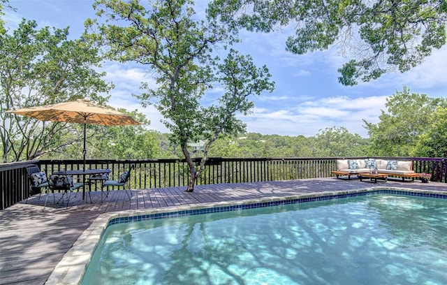 8607 Appalachian Dr, Austin, TX 78759 - view of pool with outdoor lounge area, a deck, and outdoor dining space