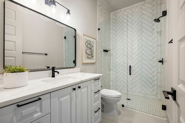 811 Wade Rd, New Braunfels, TX 78132 - full bathroom featuring vanity, toilet, a stall shower, and tile patterned floors