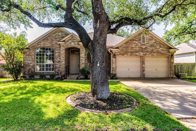1302 Roadrunner Dr, Cedar Park, TX 78613 - view of front of property featuring brick siding, a garage, and concrete driveway