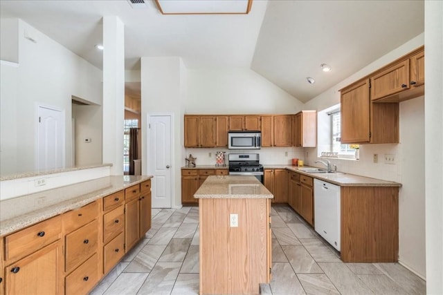 1302 Roadrunner Dr, Cedar Park, TX 78613 - kitchen featuring stainless steel appliances, a sink, light countertops, a kitchen island, and high vaulted ceiling