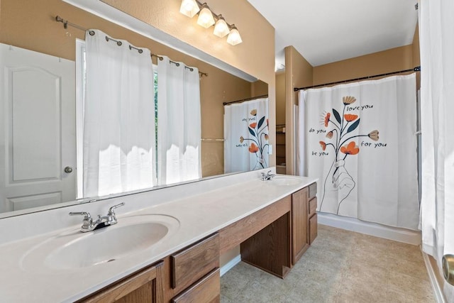full bathroom with double vanity and a shower with shower curtain