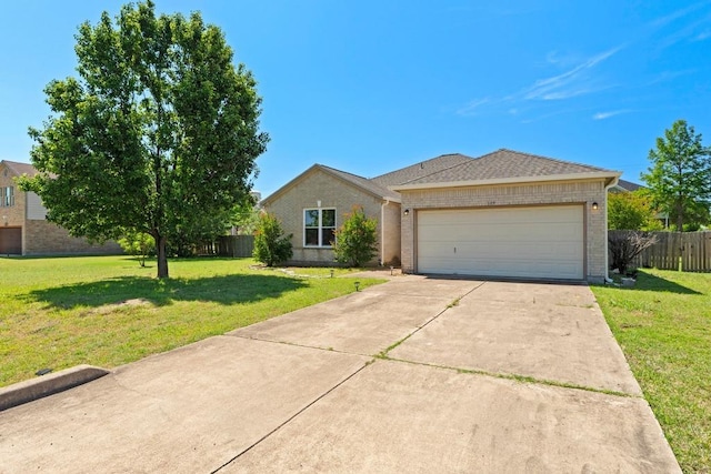 109 Silver Lace Ln, Round Rock, TX 78664 - view of front of house with brick siding, driveway, and a garage