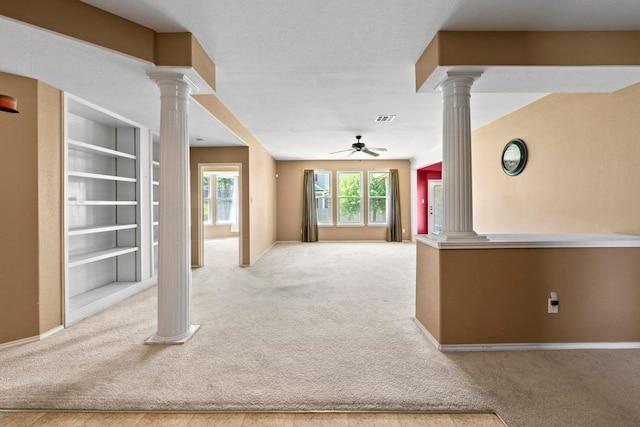 109 Silver Lace Ln, Round Rock, TX 78664 - corridor with decorative columns, carpet flooring, and baseboards