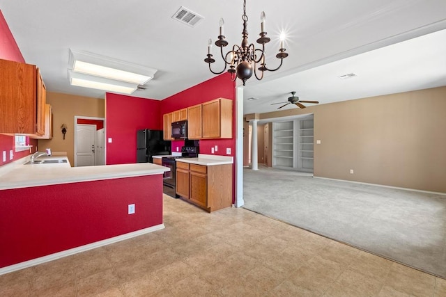 kitchen with black appliances, brown cabinets, light countertops, light flooring, and a sink