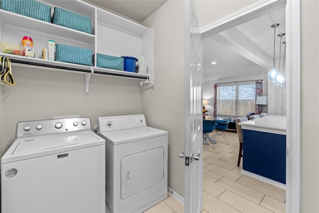 laundry area featuring separate washer and dryer