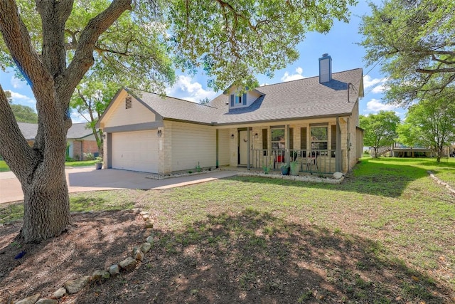 602 Toledo Trl, Georgetown, TX 78628 - view of front of house with covered porch, a garage, driveway, a chimney, and a front yard