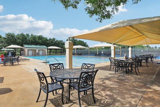 3933 Kristencreek Ln, Round Rock, TX 78681 - community pool featuring outdoor dining space and a patio area