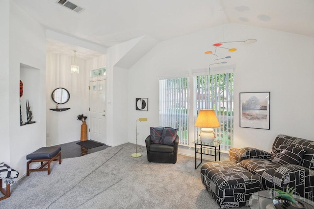 3933 Kristencreek Ln, Round Rock, TX 78681 - living room with vaulted ceiling, carpet, and a chandelier