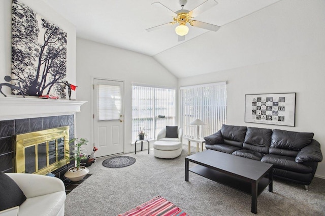 3933 Kristencreek Ln, Round Rock, TX 78681 - living area with carpet flooring, lofted ceiling, ceiling fan, and a tile fireplace