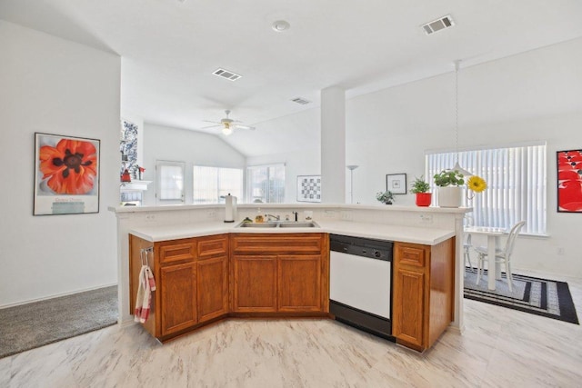 3933 Kristencreek Ln, Round Rock, TX 78681 - kitchen featuring dishwasher, brown cabinetry, light countertops, vaulted ceiling, and a ceiling fan