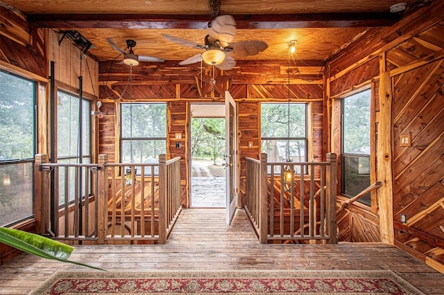914 Sand Hills Rd, Red Rock, TX 78662 - unfurnished sunroom featuring beam ceiling