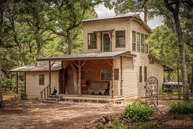 914 Sand Hills Rd, Red Rock, TX 78662 - back of house with metal roof