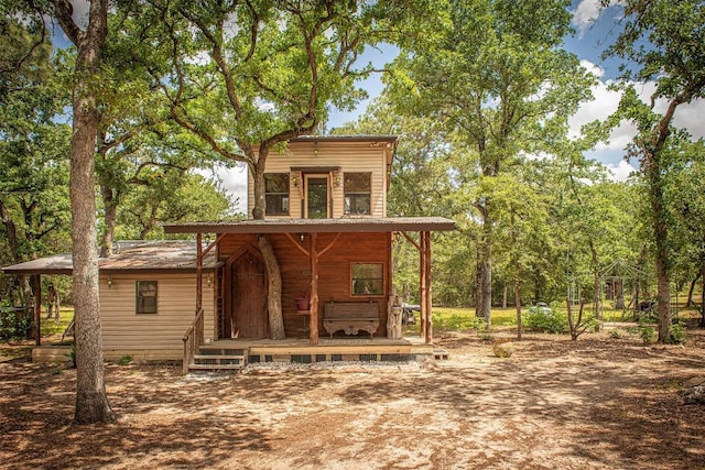 914 Sand Hills Rd, Red Rock, TX 78662 - back of property featuring a porch