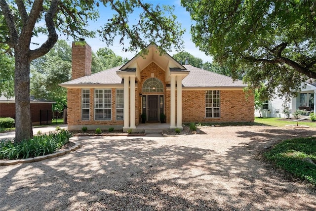 3007 Sesbania Dr, Austin, TX 78748 - single story home featuring a chimney, brick siding, and a shingled roof