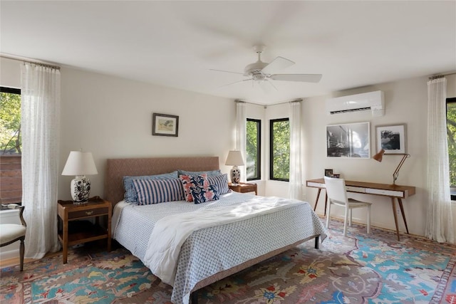 4504 Erin Ln, Austin, TX 78756 - bedroom with a wall unit AC, multiple windows, and a ceiling fan