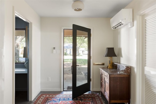 4504 Erin Ln, Austin, TX 78756 - doorway to outside featuring a wall mounted AC and baseboards