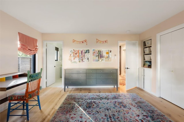 4504 Erin Ln, Austin, TX 78756 - bedroom featuring light wood-type flooring, ensuite bath, and a closet