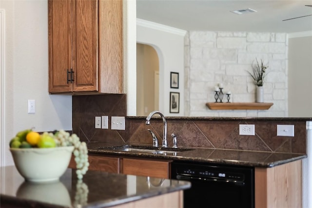 kitchen with dishwasher, crown molding, decorative backsplash, brown cabinetry, and a sink