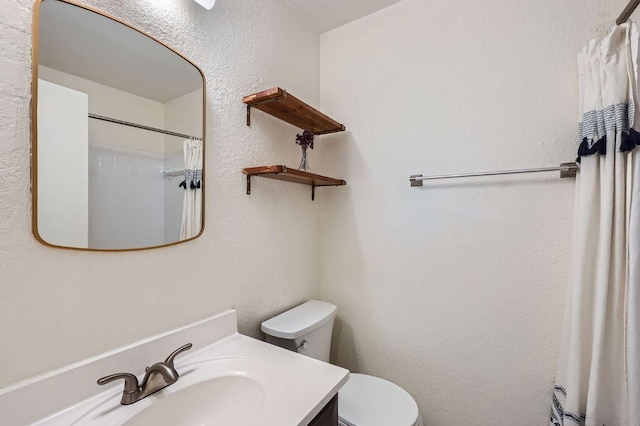 full bathroom with toilet, vanity, and a shower with shower curtain