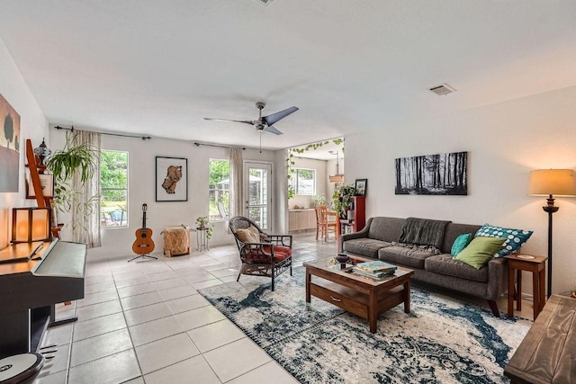 7605 Clydesdale Dr, Austin, TX 78745 - living area with light tile patterned flooring and ceiling fan