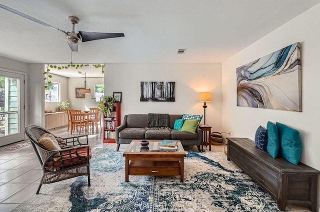 7605 Clydesdale Dr, Austin, TX 78745 - living room featuring a ceiling fan and tile patterned floors