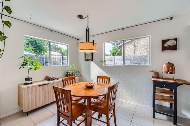 7605 Clydesdale Dr, Austin, TX 78745 - dining space featuring light tile patterned floors