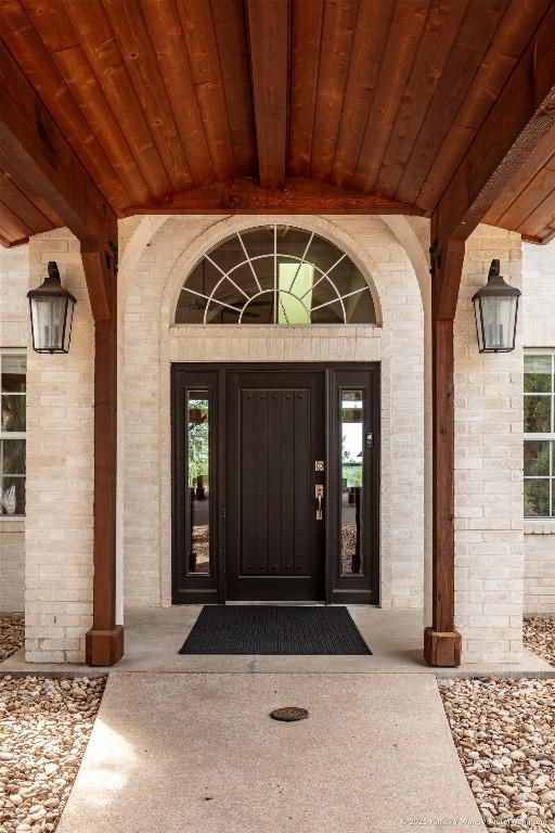 14305 Fallen Timber Dr, Austin, TX 78734 - entrance to property with brick siding
