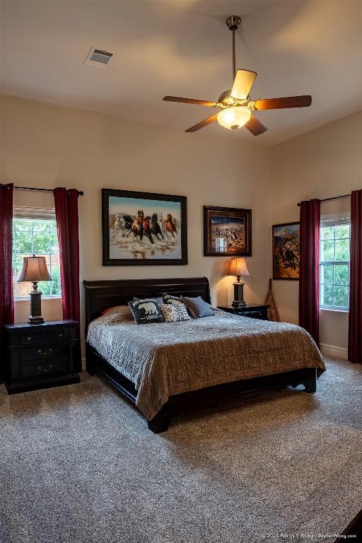 bedroom featuring carpet flooring and a ceiling fan