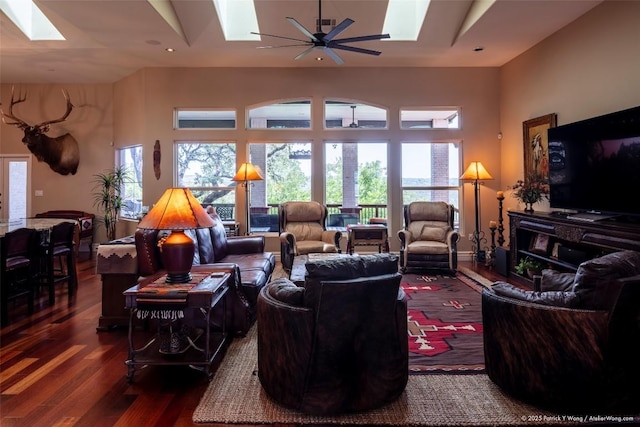 14305 Fallen Timber Dr, Austin, TX 78734 - living room featuring a skylight, dark wood finished floors, and a ceiling fan