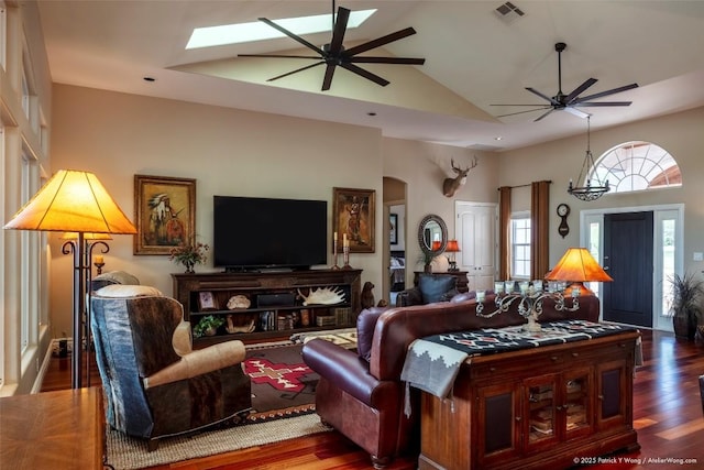 14305 Fallen Timber Dr, Austin, TX 78734 - living room featuring a ceiling fan, high vaulted ceiling, wood finished floors, a skylight, and recessed lighting