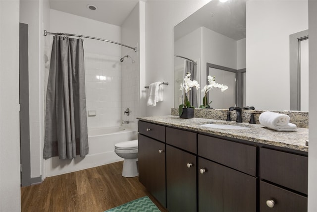 1900 Barton Springs Rd Unit 2023, Austin, TX 78704 - bathroom with wood finished floors, vanity, and shower / bathtub combination with curtain