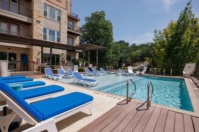 1900 Barton Springs Rd Unit 2023, Austin, TX 78704 - community pool featuring a patio and area for grilling
