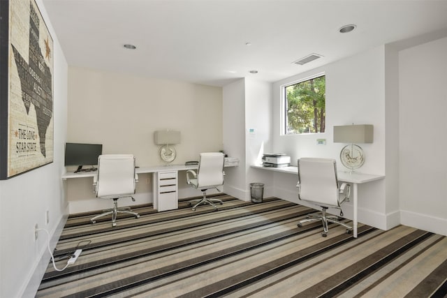 1900 Barton Springs Rd Unit 2023, Austin, TX 78704 - carpeted home office with built in desk and recessed lighting