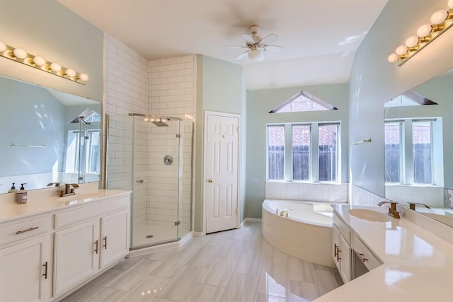 103 Savin Rise Ct, Pflugerville, TX 78660 - bathroom featuring a stall shower, a garden tub, two vanities, ceiling fan, and tile patterned flooring