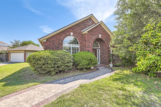 103 Savin Rise Ct, Pflugerville, TX 78660 - view of front of property featuring brick siding and a front lawn