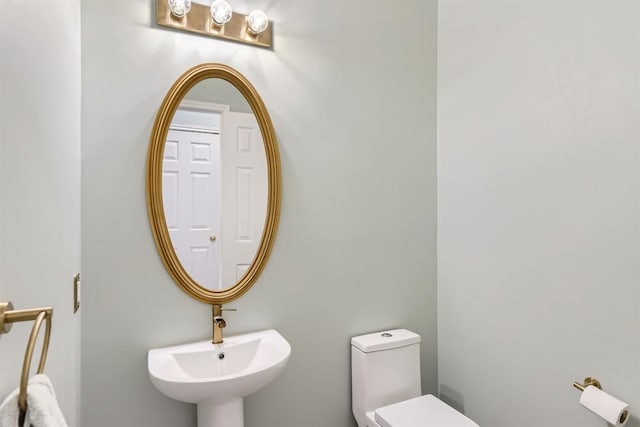 103 Savin Rise Ct, Pflugerville, TX 78660 - half bathroom with toilet and a sink