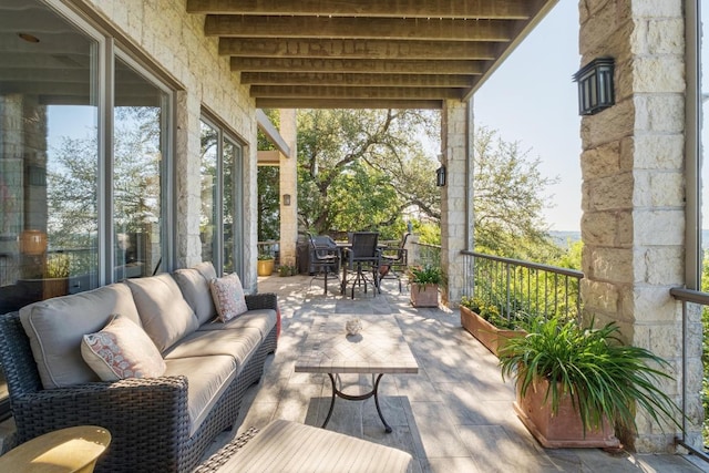 6605 W Courtyard Dr, Austin, TX 78730 - view of patio with an outdoor living space and outdoor dining area
