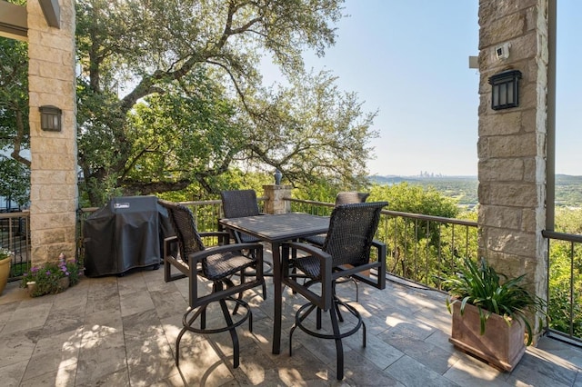 6605 W Courtyard Dr, Austin, TX 78730 - view of patio with area for grilling and outdoor dining space