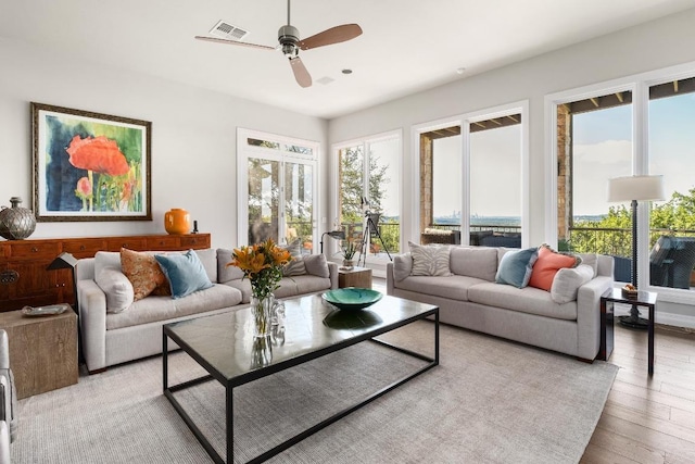 6605 W Courtyard Dr, Austin, TX 78730 - living room featuring light wood-type flooring and ceiling fan