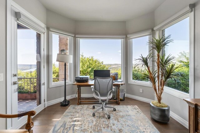 6605 W Courtyard Dr, Austin, TX 78730 - office area with healthy amount of natural light and wood finished floors
