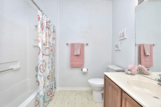 221 Bonham Loop, Georgetown, TX 78633 - bathroom featuring tile patterned floors, toilet, vanity, shower / bath combo with shower curtain, and baseboards