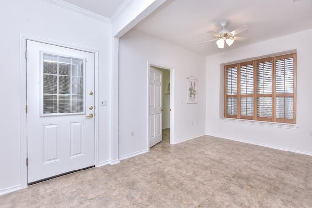 221 Bonham Loop, Georgetown, TX 78633 - foyer featuring a ceiling fan, baseboards, and ornamental molding
