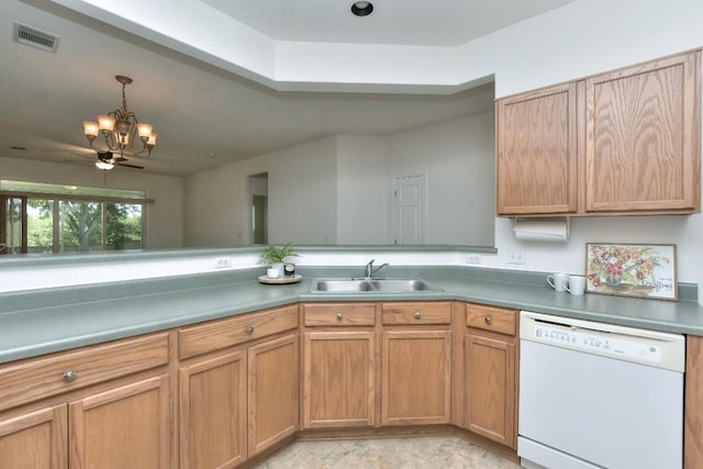 221 Bonham Loop, Georgetown, TX 78633 - kitchen featuring white dishwasher, a sink, a chandelier, and decorative light fixtures