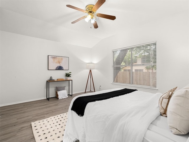 10719 Watchful Fox Dr, Austin, TX 78748 - bedroom featuring wood finished floors, baseboards, a ceiling fan, and lofted ceiling